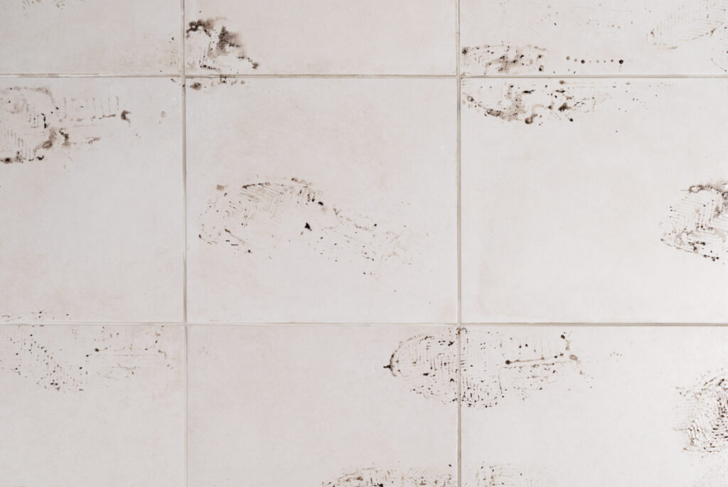 shoe sole marks on the floor of ceramic tiles