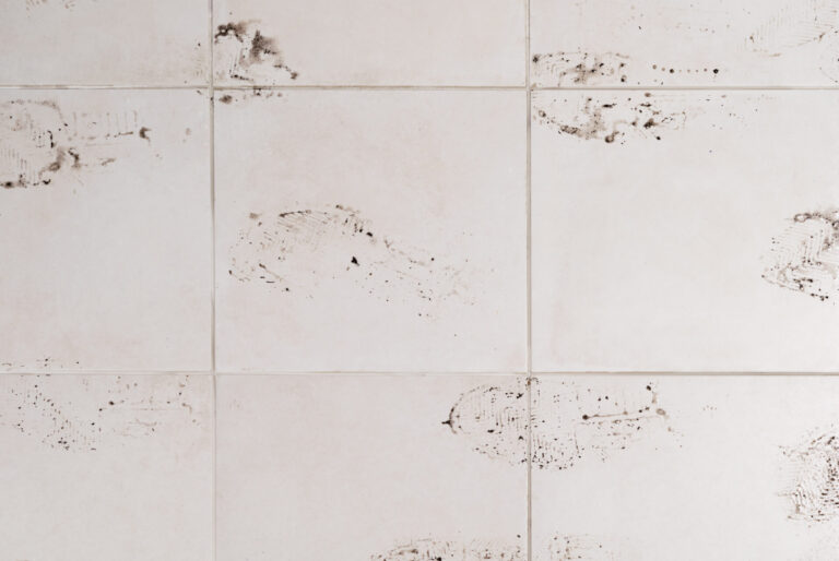 shoe sole marks on the floor of ceramic tiles